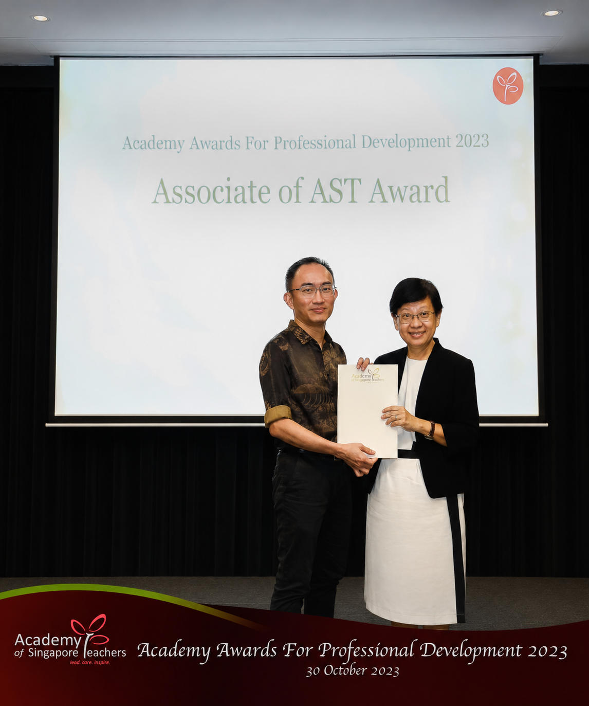 Teacher receiving award